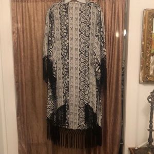 Elegant duster movement as you enter room